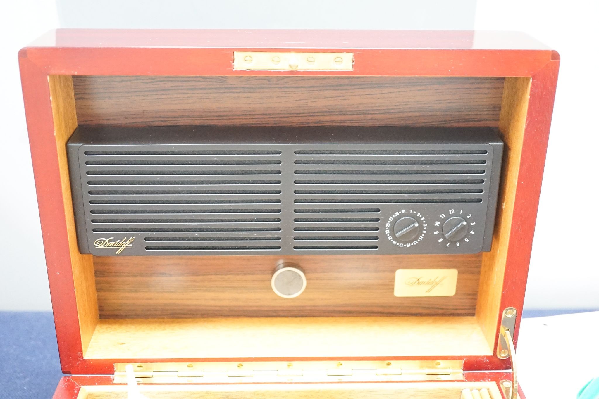 A Davidoff cigar humidor with ash tray, crocodile skin cigar holder etc.